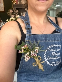 Blue thistle and waxflower buttonhole