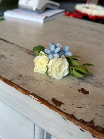 White Spray rose with  Blue Oxypetalum Buttonhole